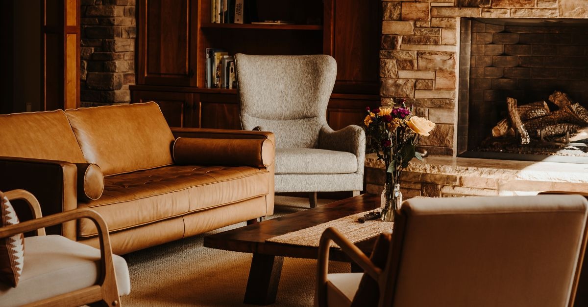 By the window, wooden living Room table with 6 chairs around