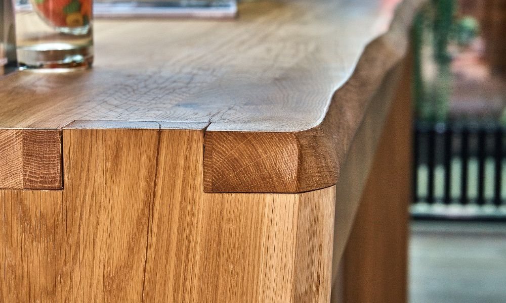 Showing A corner of wooden table 