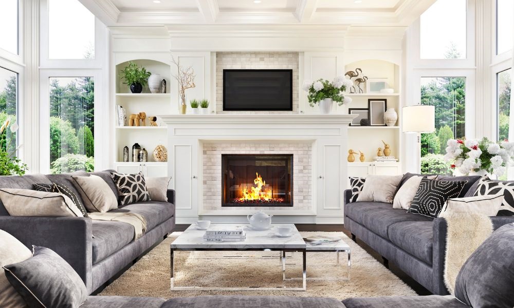 Sofa set and fireplace in the middle of photo